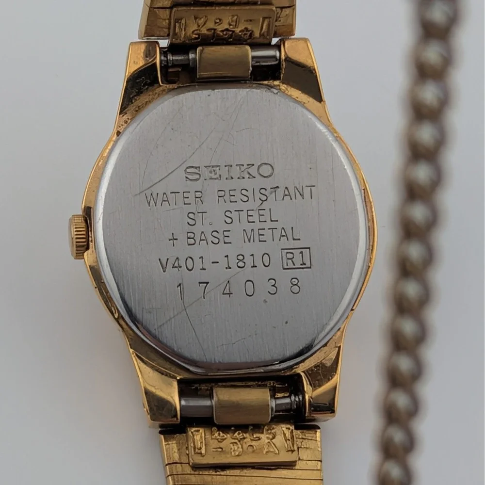 Vintage Seiko V401-1810 Gold Tone Textured Dial Dress Watch 20mm 6.25